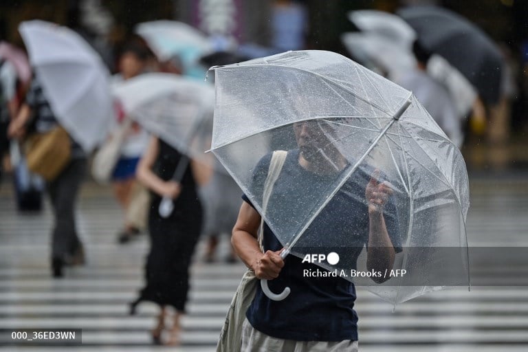 Four missing in landslide as typhoon rains lash Japan